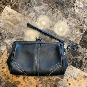 Sleek Black Leather Coach Wristlet Clutch with Kiss Lock Closure